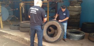 A polícia civil e o Ipem interditaram uma empresa clandestina de recapagem de pneus em MT