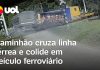 Caminhão se choca com trem que transportava trabalhadores após atravessar a ferrovia; confira